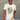 Urban mockup featuring a smiling man in a speckled Hashies ramen t-shirt. Stylish and casual, perfect for promoting relaxed streetwear fashion.