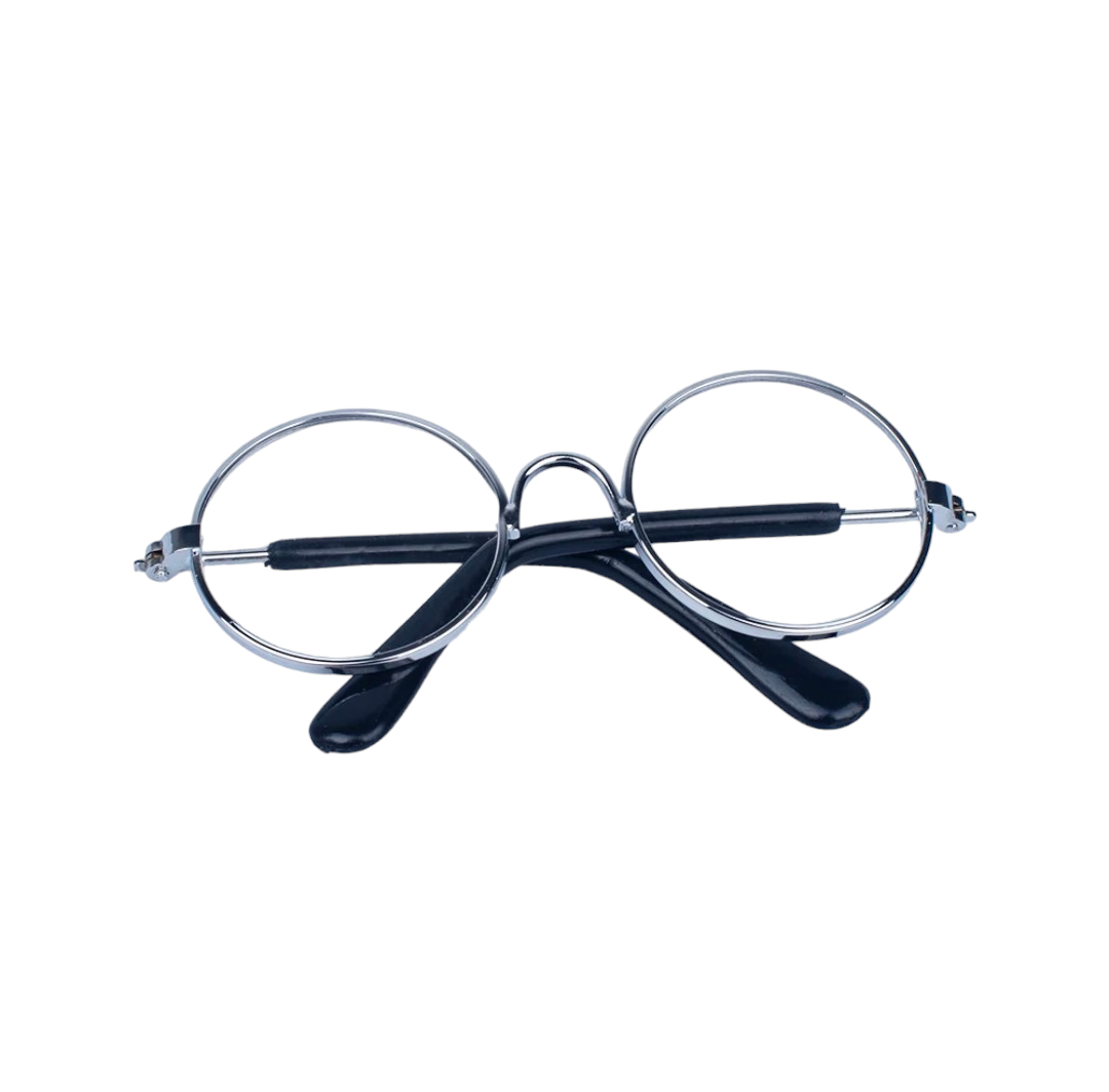 Vintage-style round glasses with thin metal frame and black earpieces on a white background.