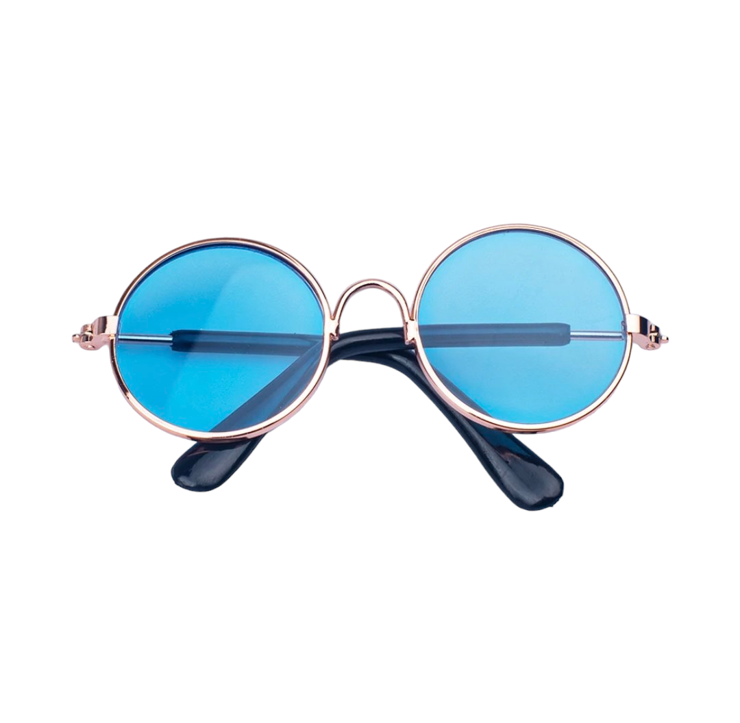 Hashies™ vibrant blue-lensed round sunglasses with a gold-tone metal frame and black earpieces on a white backdrop.