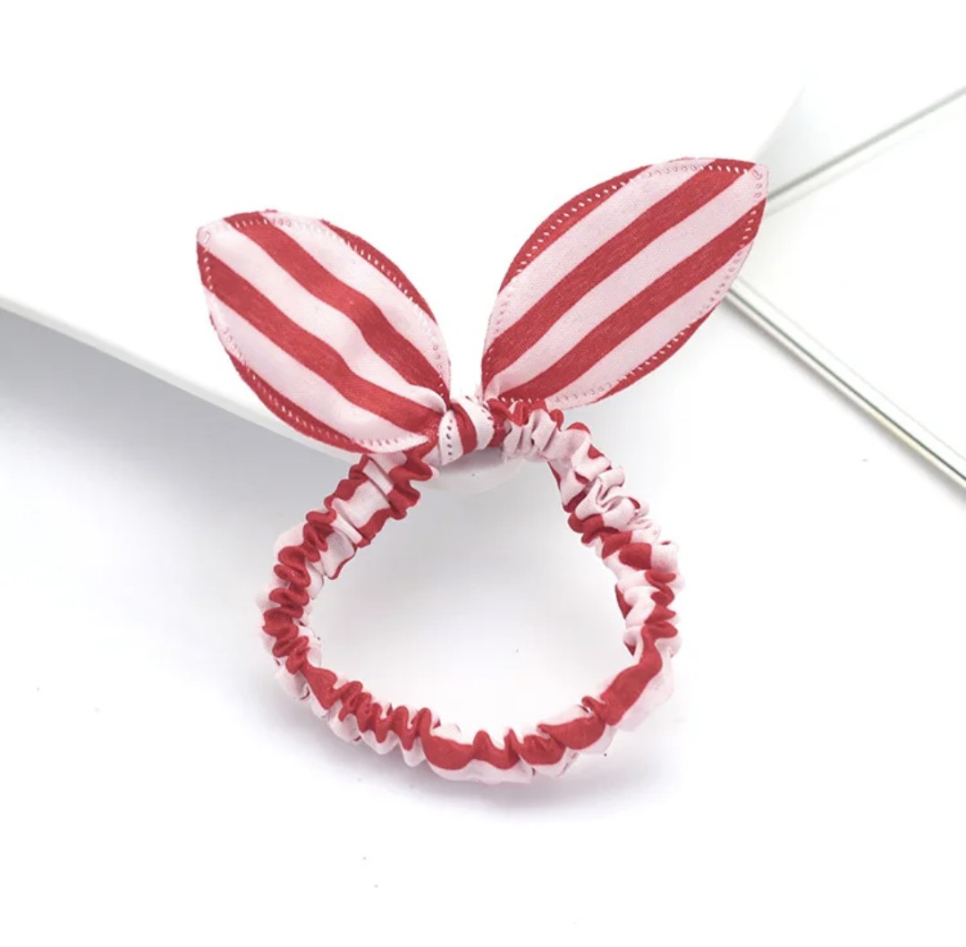The image showcases a red and white striped bunny ear headband, an accessory that brings a playful yet classic flair to Hashies or as a joyful touch for desk pets.