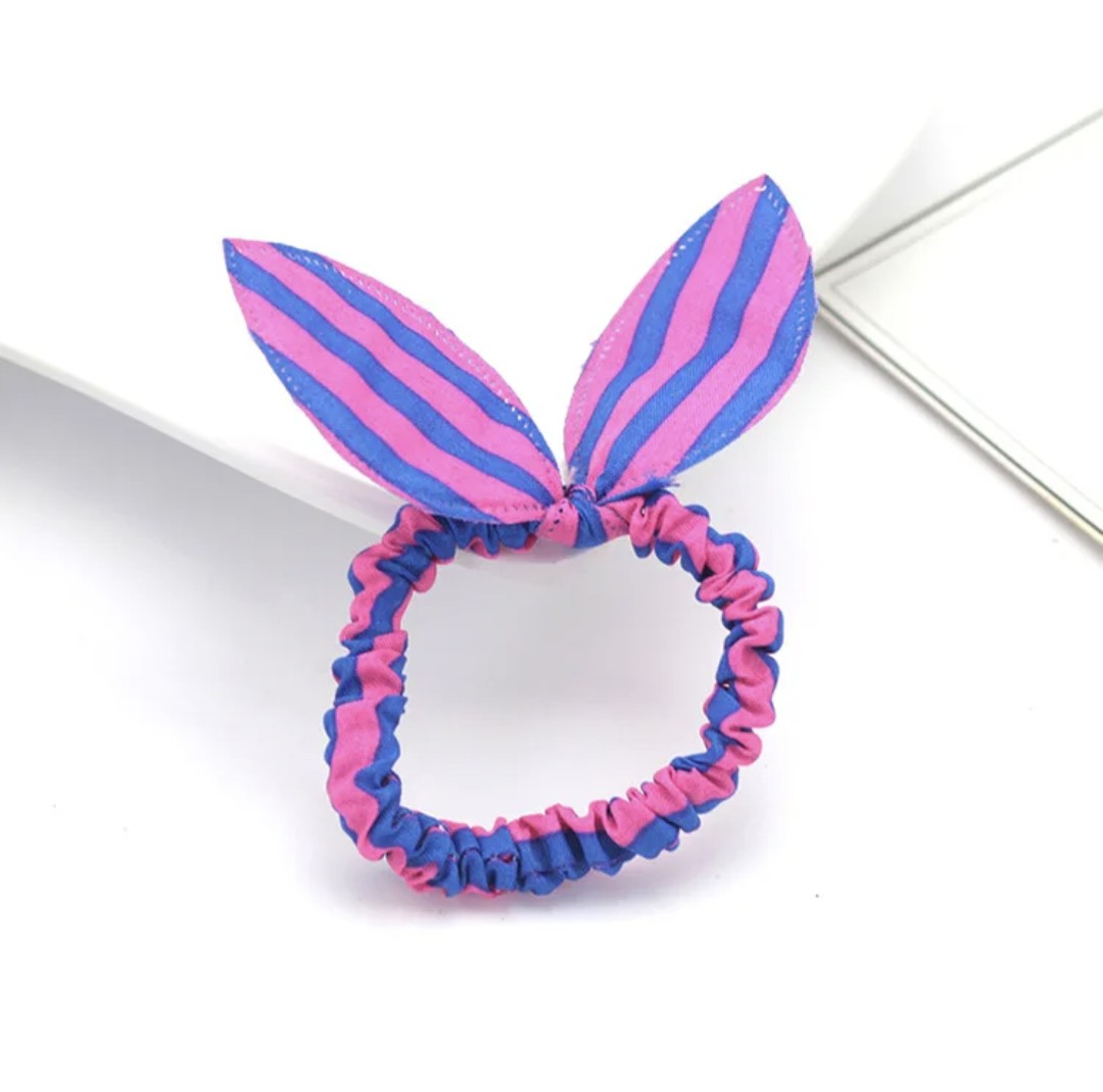 The image exhibits a blue and pink striped bunny ear headband, an accessory that radiates playful energy and charm for Hashies or as a vibrant touch for desk pets.